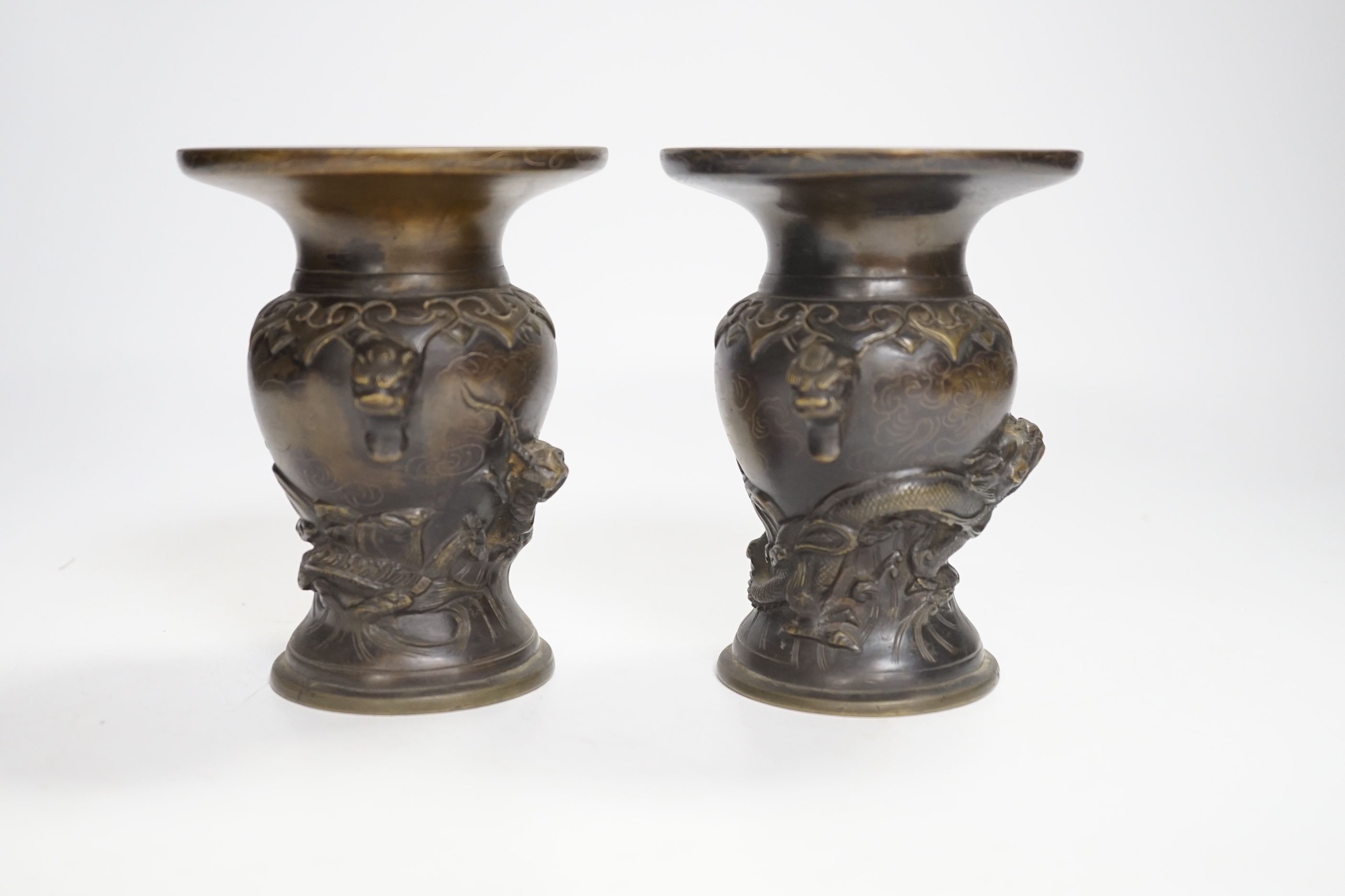 A pair of small Japanese bronze 'dragon' vases, 12.5cm